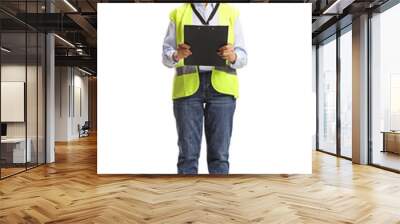 Full length portrait of a female site engineer with a safety vest and hardhat Wall mural