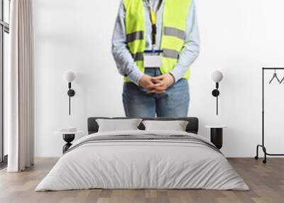 Full length portrait of a young female engineer with a safety vest and hardhat Wall mural