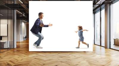 Full length profile shot of a little girl spreading arms and running to her father Wall mural