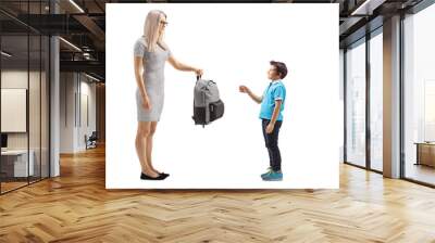 Full length shot of a mother giving a backpack to a boy Wall mural