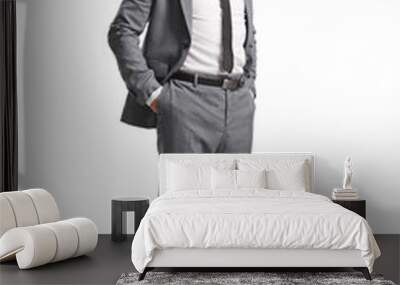 Full length shot of a smiling man in gray suit and tie Wall mural