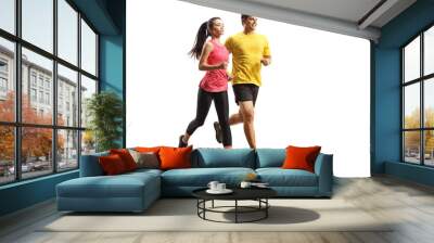 Full length shot of a young man and woman in sportswear jogging Wall mural