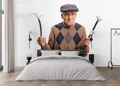 Grumpy elderly man with a broken cable Wall mural