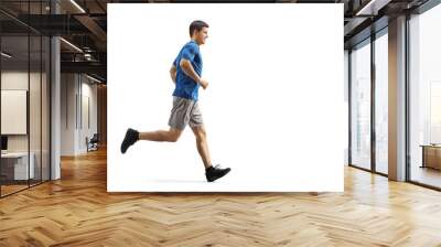 Guy in sports clothes running Wall mural