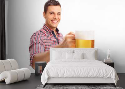 Joyful man holding a large beer mug Wall mural