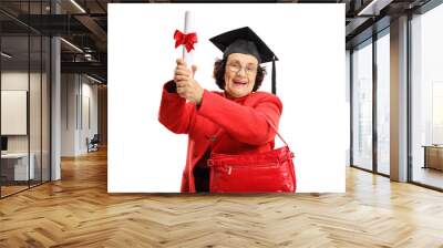 Joyful senior lady with a diploma and a graduation hat Wall mural