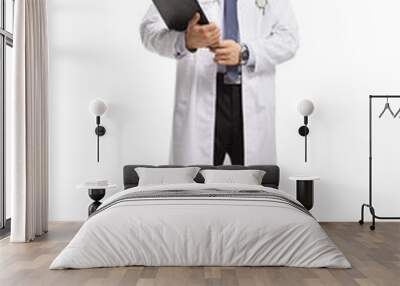 Male physician holding a document on a clipboard Wall mural