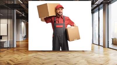 Male worker holding two cardboard boxes Wall mural