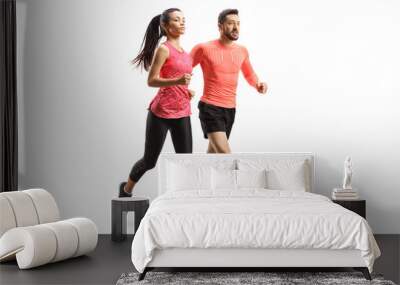 Man and woman in sportswear running together Wall mural