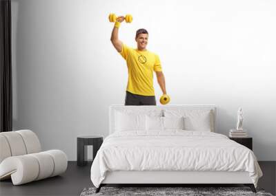 Man exercising with dumbbells Wall mural