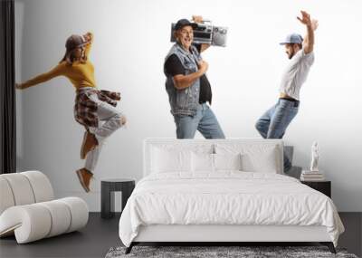 Mature man with a boombox and young people dancing Wall mural