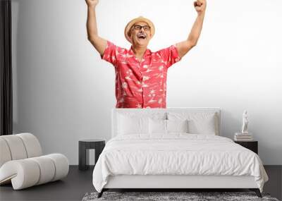 Overjoyed mature man gesturing happiness and looking up Wall mural