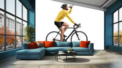 Profile shot of a male athlete riding a bike and drinking from a bottle Wall mural