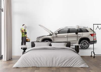 Roadside car mechanic holding a tool box and looking at a SUV with an open hood Wall mural