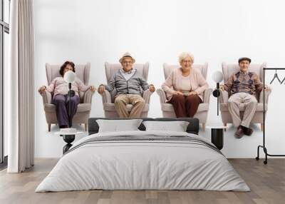 Senior people sitting in armchairs Wall mural