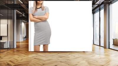 Young blond casual woman leaning on wall Wall mural