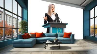 Young businesswoman giving a speech on a pedestal Wall mural