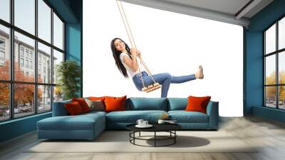 Young carefree girl swinging on a swing Wall mural