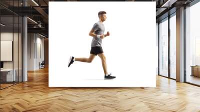 Young guy jogging Wall mural