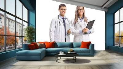 Young male and female doctors smiling Wall mural