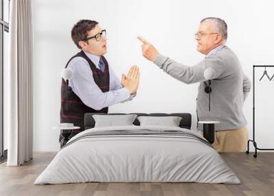 young man begging an older angry man Wall mural