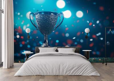 A golf tournament trophy displayed proudly, capturing the winning moment with celebratory elements such as confetti and a backdrop of cheering spectators, the trophy gleaming under bright lights, Wall mural