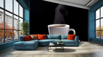 white cup of hot coffe with smoke with coffee beans and on black background  Wall mural