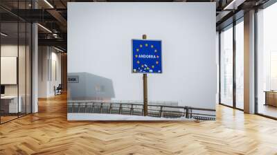 A welcome sign in Andorra in a cold haze weather in Europe Wall mural