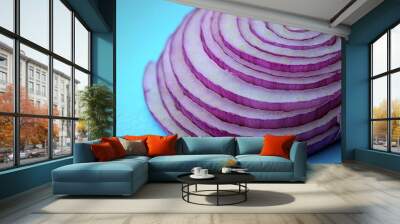 Macro shot of a sliced purple onion showing layers on a gradient background of cobalt blue and soft white, dynamic lines, striking details, have large negative space for text Wall mural