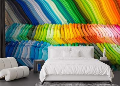 Lines of colorful clothing from clothes store Wall mural