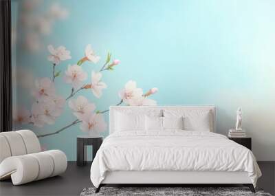 Delicate illustration of cherry blossom branches with soft pink flowers against a muted pastel sky, capturing the fleeting beauty of nature and the concept of mono no aware Wall mural