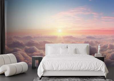 Beautiful sunset above the clouds. Aerial view. Nature background of sky. Cloudy landscape from the window of an airplane. Sunrise. Sun goes into the clouds. Illustration for varied design. Wall mural