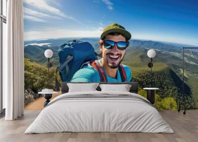 Happy and smiling young hiker man taking selfie portrait on the top of mountain. Handsome male traveler. Tourism, healthy lifestyle  or sport life style concept. Illustration for design. Wall mural