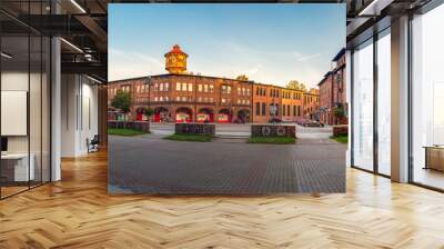 Katowice, Silesia, Poland; September 29, 2021: View on central square (plac Wyzwolenia) in historical district Nikiszowiec in the morning light. Old, brick buildings. Wall mural