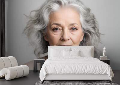 Portrait of beautiful senior woman with grey hair on a light background. Healthy face skin care beauty, skincare cosmetics, dental. Wall mural