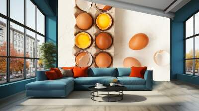 fresh raw eggs are brown and white, egg yolks and whites. Wall mural