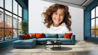 Portrait of a cute little girl with long curly hair on white background Wall mural