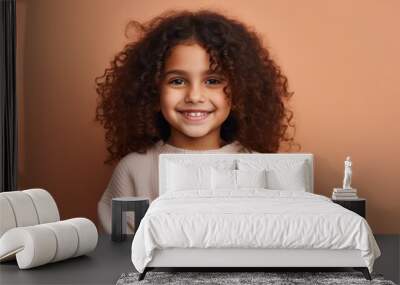 Portrait of cute little african american girl with curly hair Wall mural