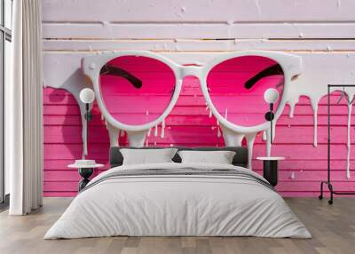 Pink paint dripping out of white painted sunglasses. Creative fashion minimal concept Wall mural