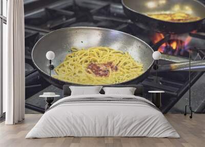 Cooking pan, spaghetti cooking in a professional italian kitchen Wall mural