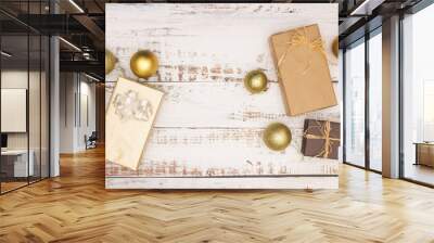 Beautiful gold Christmas decoration on wooden table  Wall mural