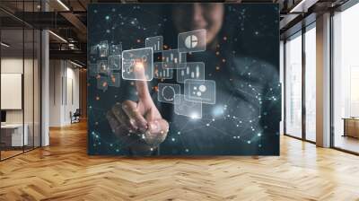 Big data analytics and business intelligence concept with chart and graph icons on a digital screen interface and a businesswoman in background Wall mural