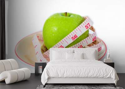 dieting and health food. Yellow, green apple with  tape measure Wall mural