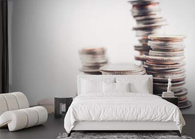 money coins arranged as a graph on white background Wall mural