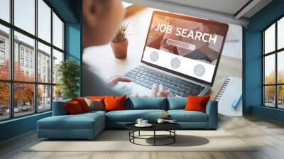 woman using laptop for job search concept, find your career, woman looking at online website Wall mural