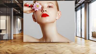 Aesthetic Cosmetology. Spring Woman. Beauty Summer model girl with colorful flowers . Beautiful Lady with Blooming flowers. Holiday Fashion Makeup. Wall mural