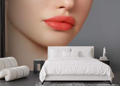 Closeup portrait of beautiful woman with bright make-up and red lips. Attractive model with a red lipstick. Wall mural