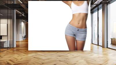 sporty girl in black bikini posing on white background. photo of attractive girl with slim toned bod Wall mural