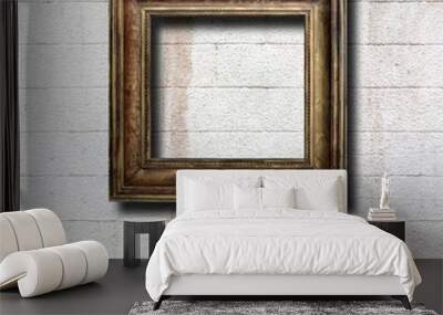 Gilded wooden frames for pictures on old stone wall Wall mural