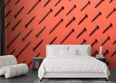 colorful screw pattern top view on red background Wall mural